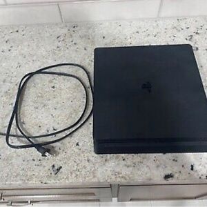 PlayStation slim for sale trying to get rid of.